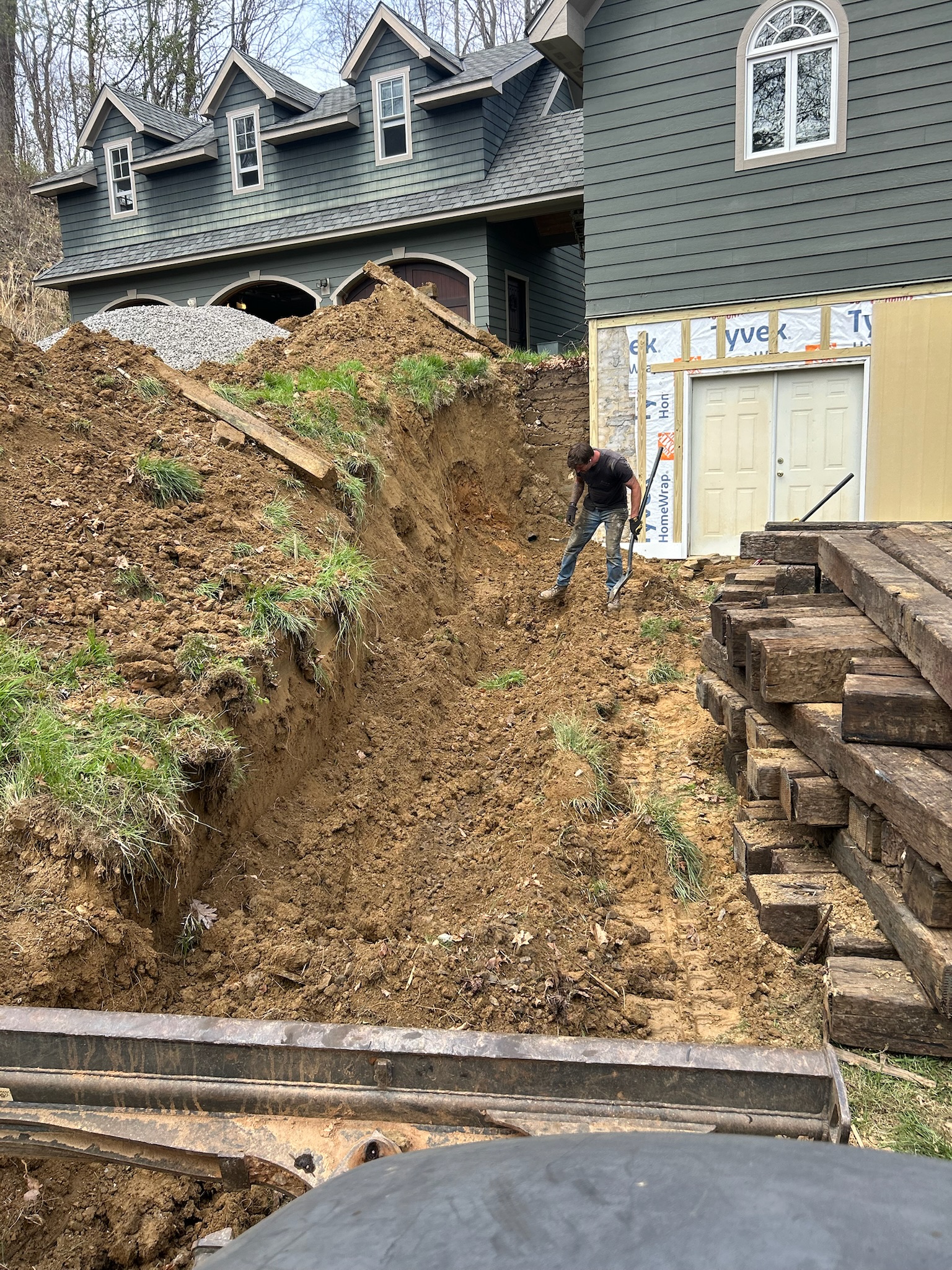 Deep trench excavation next to WNC home