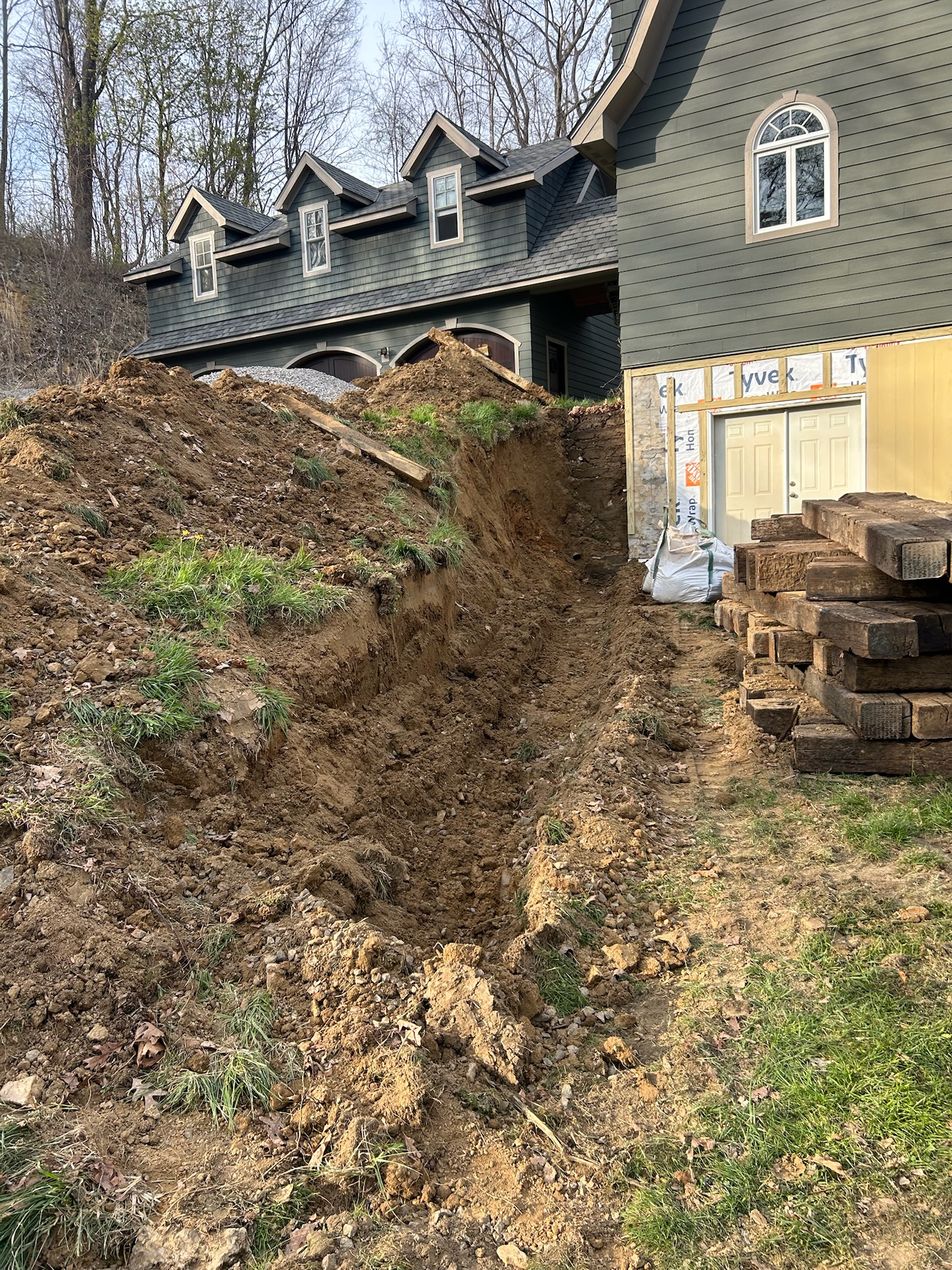 Trench cut along WNC house foundation